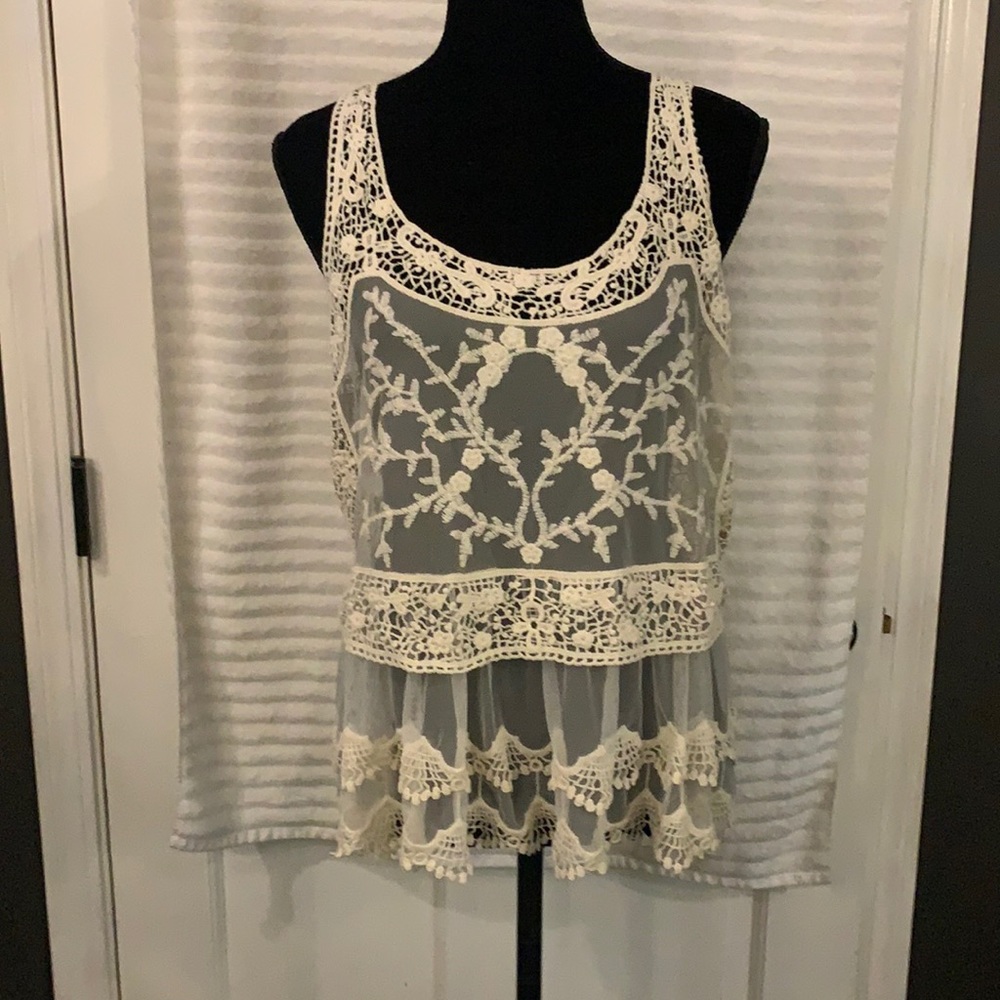Express cream lace and crocheted peplum top